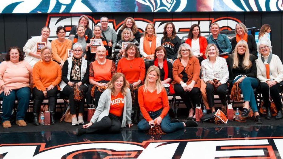 First Lady Jean Callahan (front row, right) with other women leaders from the campus and community at a women's basketball game